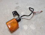 Suzuki DR350SE Front Left Turn Signal Flasher Light & Bracket. Fixed Price $32.00.